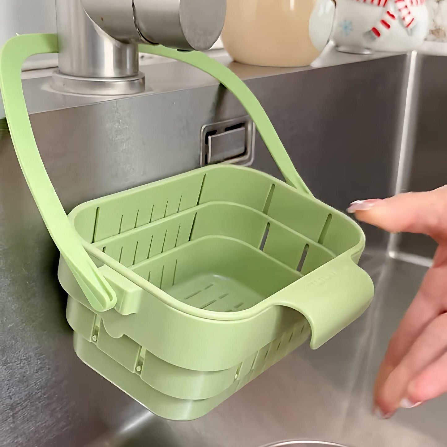 Hanging, foldable, and telescopic dish drying basket for kitchen sinks — separates food residue and filters fruits during washing and storage.