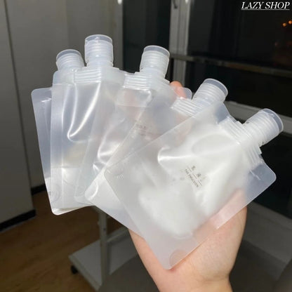 Travel toiletry bag for cosmetics, shampoo, lotion, shower gel, and facial cleanser; portable squeeze refillable bottles for travel and business trips