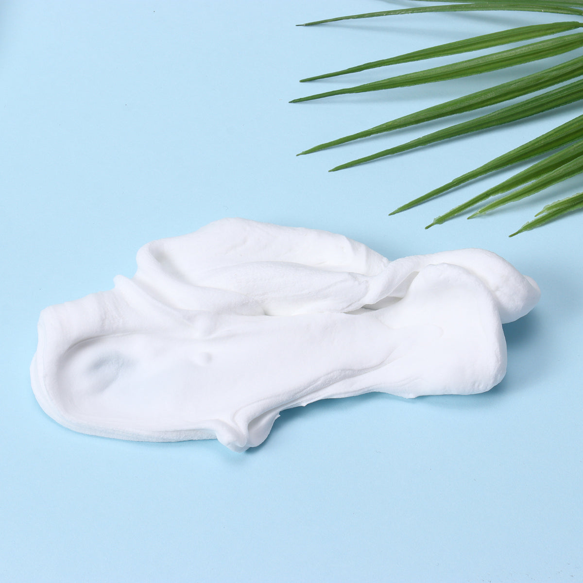 White sealing putty displayed on a blue background