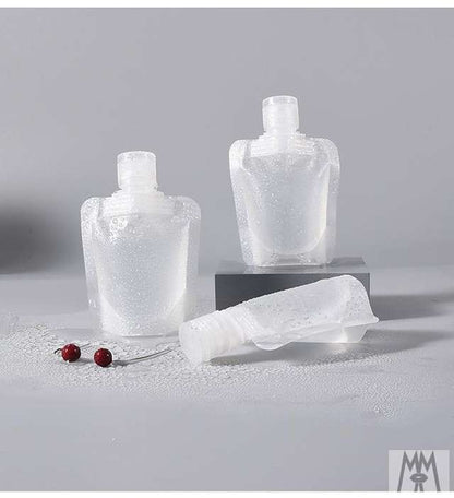Travel toiletry bag for cosmetics, shampoo, lotion, shower gel, and facial cleanser; portable squeeze refillable bottles for travel and business trips