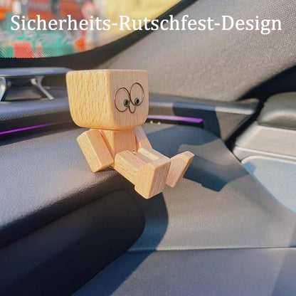 Charmante kleine Holzfigur. die mit 12 magnetischen Ausdrücken schwankt