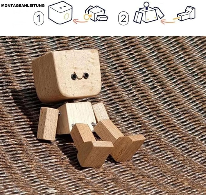 Charmante kleine Holzfigur. die mit 12 magnetischen Ausdrücken schwankt