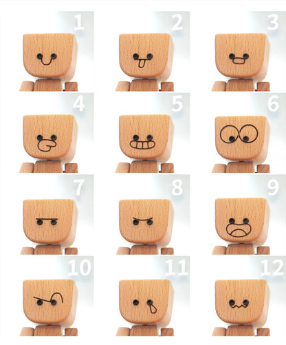 Charmante kleine Holzfigur. die mit 12 magnetischen Ausdrücken schwankt